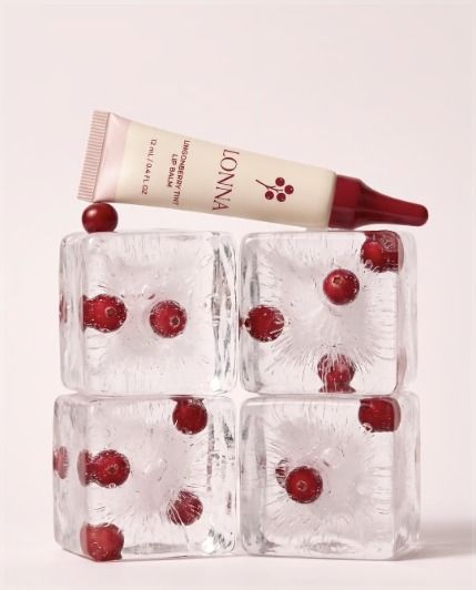 Lip tint on red ice cubes